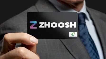 Suit man holding Zhoosh